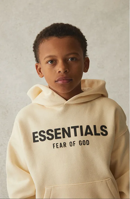 FEAR OF GOD ESSENTIALS HOODIE BUTTERCREAM KIDS/JR