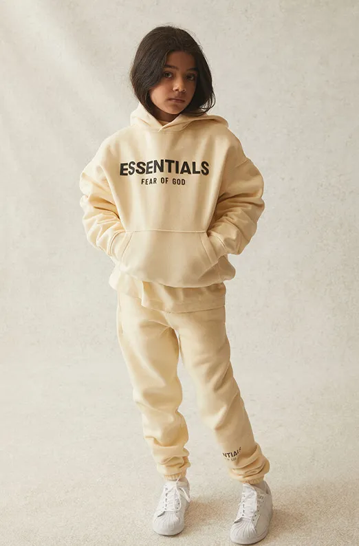 FEAR OF GOD ESSENTIALS HOODIE BUTTERCREAM KIDS/JR