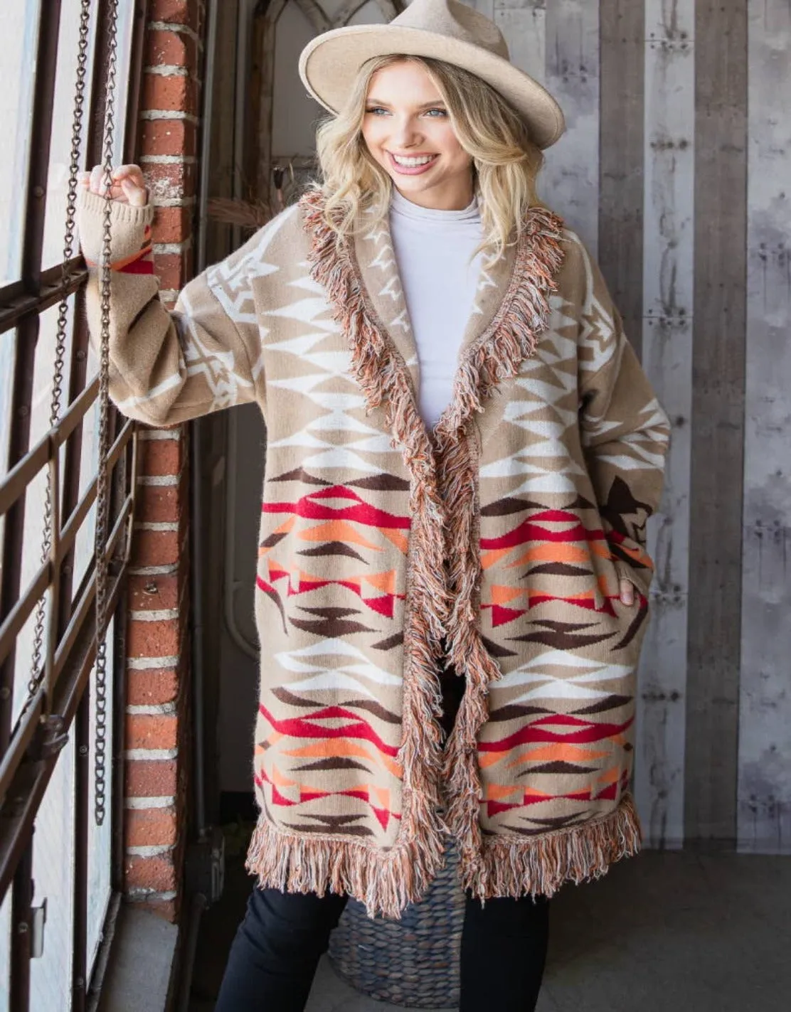 Soft Aztec knit cardigan with fringe detail