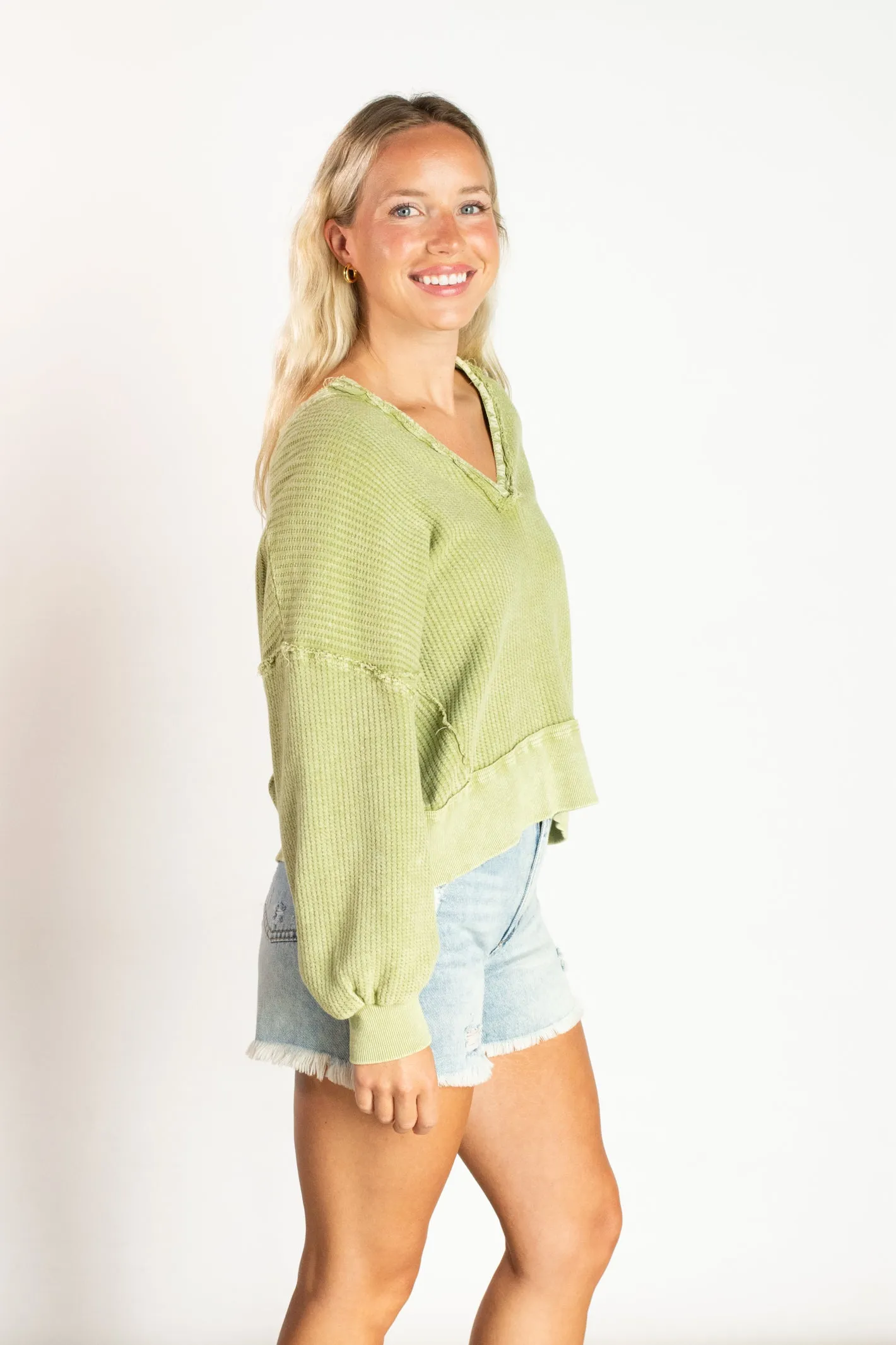 Well Traveled Green Sweater