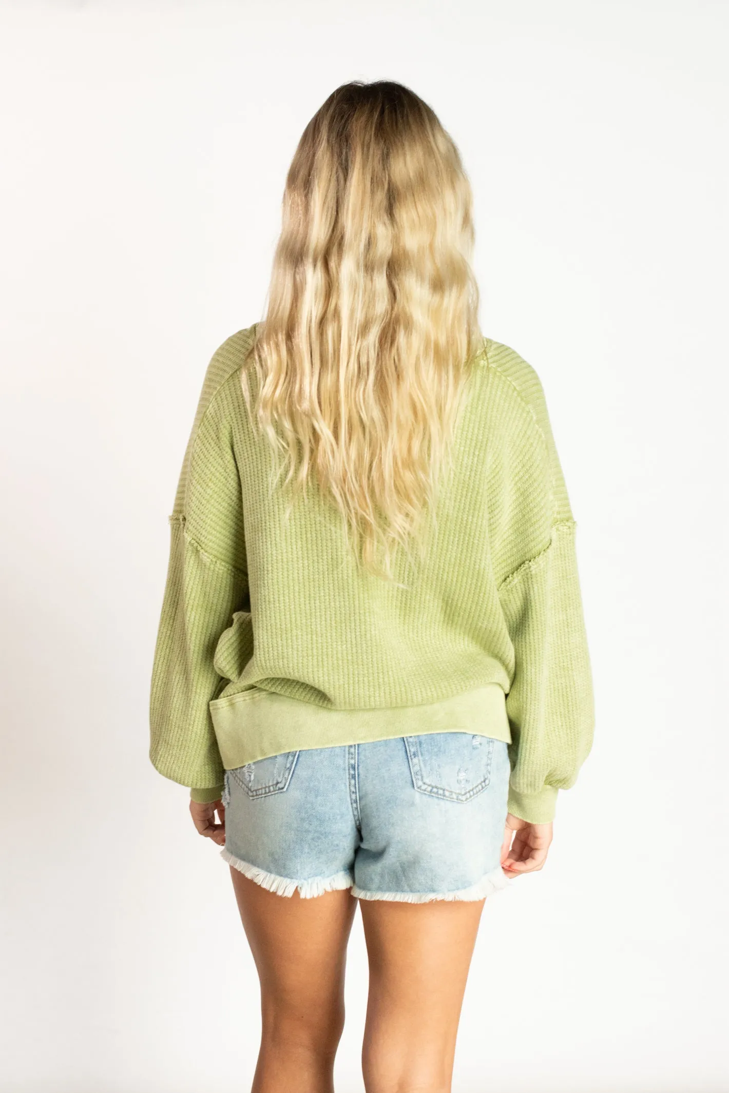 Well Traveled Green Sweater